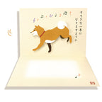 Shibata-san birthday card opened to show the moving Shiba Inu inside.
